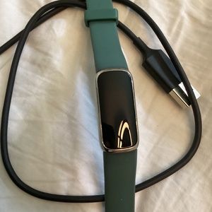 Fitbit Luxe with variety of long bands